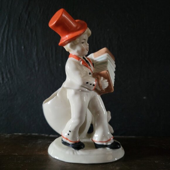 Vintage Accordion Player Porcelain Figurine with Cracked Egg Planter - Picture 3 of 12